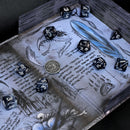 Different class cube sets in folian etui (10 Dice, 1 coin)